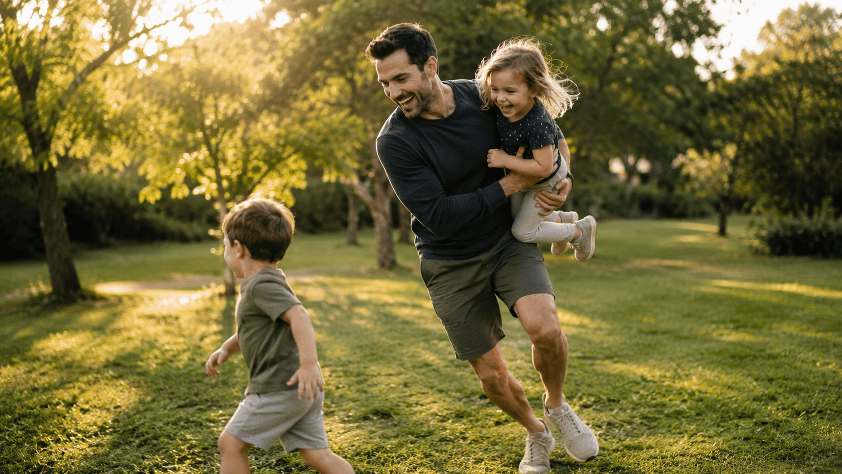 A father playing with his children outdoors, illustrating how NEAT fits naturally into family life