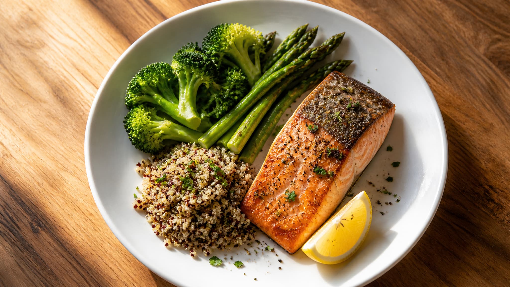 Balanced plate with grilled fish and vegetables representing high-quality whole-food protein sources