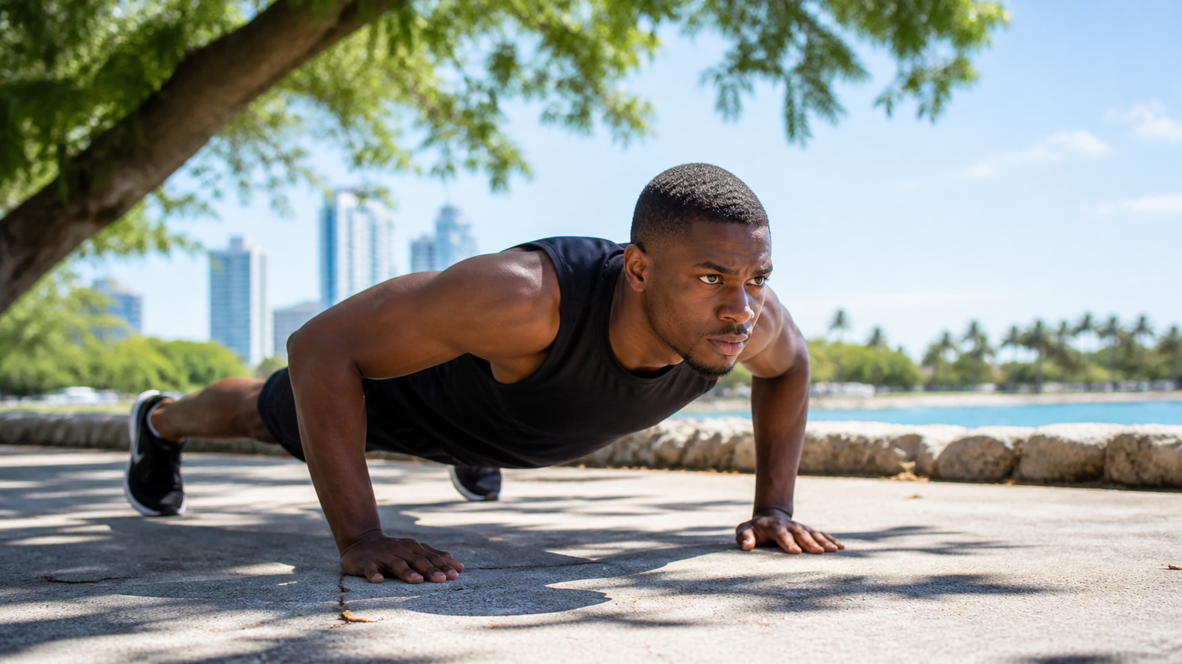 Person exercising outdoors in warm summer weather, maintaining their training routine as a non-negotiable habit
