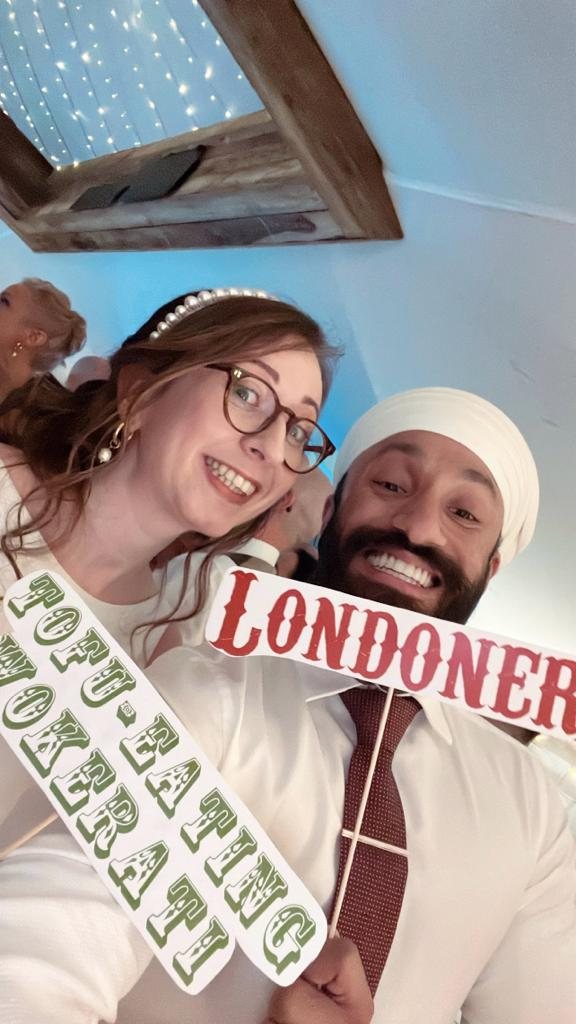 Tanvir with Emily, celebrating on the wedding day.